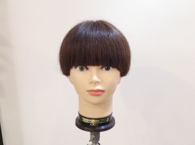 耳掛けしやすいように前髪長め。キッズカット男の子キッズカット毛流れパーマセンターパート小学生男子