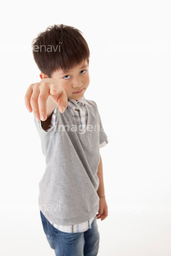 Foto de Stock 指差しポーズの女性Adobe Stock