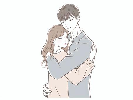 ハグをする高校生の男女